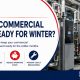 Commercial heating engineer servicing commercial boilers in a plant room to prepare the system for reliable and efficient winter operation.